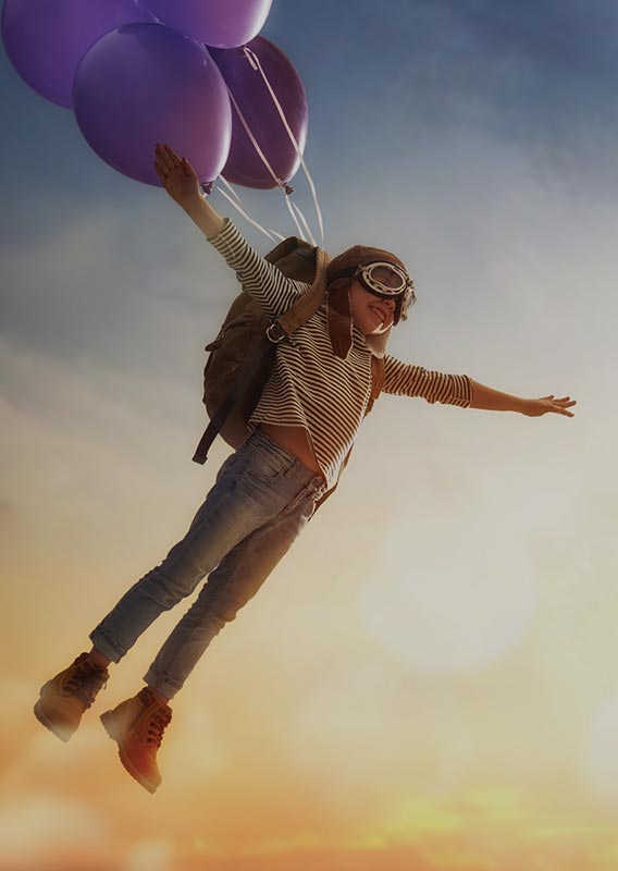 An illustration of a child floating through the sky on balloons.